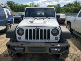 2016 Jeep Wrangler Unlimited Sahara with VIN 1C4BJWEG1GL328101, listed as a Copart auction lot 52754865 with 65,106 mi miles and Salvage title. Bid and sale history available at DreamBid. Image 5.