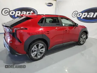 2023 Subaru Solterra Premium z VIN JTMABABAXPA024028, wystawiony jako Copart lot #73780443 z przebiegiem 4074 mil mil oraz . Historia ofert i sprzedaży dostępna na DreamBid. Obrazek 3.