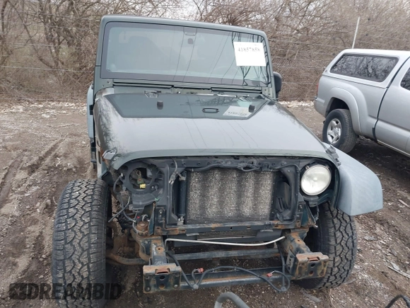 2011 Jeep Wrangler Sport with VIN 1J4AA2D18BL588273, listed as a IAAI auction lot 41857858 with 136,473 mi miles and . Bid and sale history available at carsss.com. Image 12.