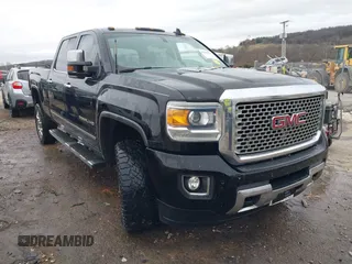 2015 GMC Sierra 2500HD available WiFi Denali with VIN 1GT120E87FF629967, listed as a IAAI auction lot 41466177 with 177,877 mi miles. Bid and sale history available at carsss.com. Image 1.