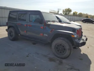 2020 Jeep Wrangler Unlimited Willys with VIN 1C4HJXDGXLW111995, listed as a Copart auction lot 77021624 with 43,074 mi miles and Salvage title. Bid and sale history available at DreamBid. Image 4.