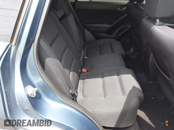 2016 Mazda CX-5 Touring z VIN JM3KE2CY3G0728968, wystawiony jako IAAI lot #42189174 z przebiegiem 145 977 mil mil oraz . Historia ofert i sprzedaży dostępna na DreamBid. Obrazek 8.