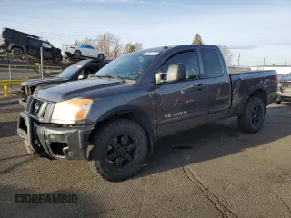 2011 Nissan Titan PRO-4X with VIN 1N6AA0CC4BN322764, listed as a Copart auction lot 49771185 with 199,438 mi miles and Salvage Title. Bid and sale history available at carsss.com. Image 1.
