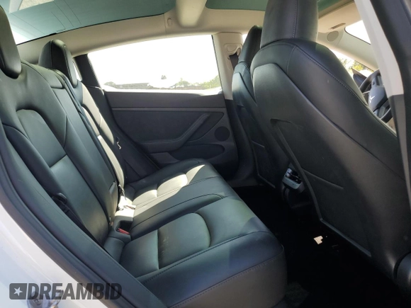 2023 Tesla Model 3 с VIN 5YJ3E1EAXPF541042, выставлен на аукционе Copart как лот 52898805 с пробегом 59 724 миль миль и Списание • Salvage title. История ставок и продаж доступна на DreamBid. Изображение 10.