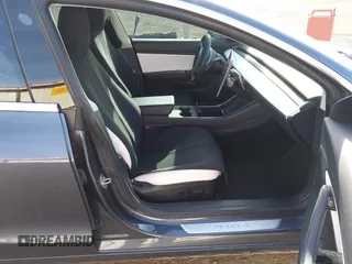 2020 Tesla Model 3 Long Range with VIN 5YJ3E1EB3LF801834, listed as a IAAI auction lot 42015079 with 47,793 mi miles. Bid and sale history available at carsss.com. Image 5.