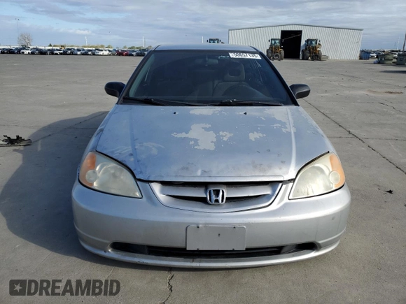 2002 Honda Civic DX with VIN 1HGEM22212L020068, listed as a Copart auction lot 50657135 with Not Provided miles and Salvage Title. Bid and sale history available at DreamBid. Image 5.
