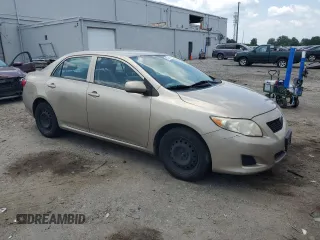 2010 Toyota Corolla with VIN 2T1BU4EE3AC315245, listed as a Copart auction lot 61336985 with 163,168 mi miles and Salvage title. Bid and sale history available at DreamBid. Image 4.