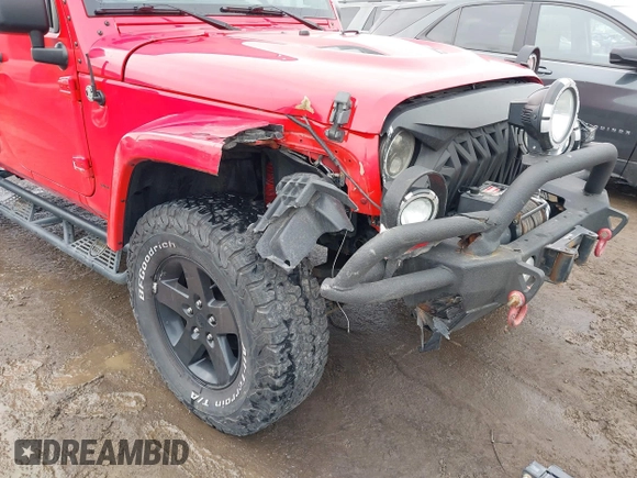 2015 Jeep Wrangler Unlimited Sahara with VIN 1C4BJWEG3FL590491, listed as a IAAI auction lot 41642219 with 148,759 mi miles. Bid and sale history available at carsss.com. Image 6.