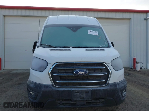 2020 Ford Transit Cargo with VIN 1FTBR3U83LKA32806, listed as a IAAI auction lot 41364870 with 173,822 mi miles and . Bid and sale history available at DreamBid. Image 12.