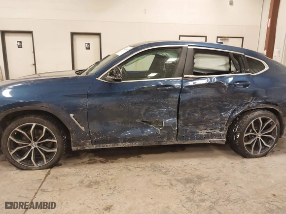 2023 BMW X4 xDrive30i with VIN 5UX33DT01P9R31277, listed as a IAAI auction lot 41618617 with 23,952 mi miles. Bid and sale history available at carsss.com. Image 6.