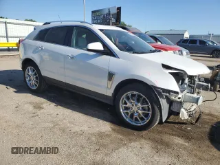 2014 Cadillac SRX Premium Collection z VIN 3GYFNGE34ES662777, wystawiony jako Copart lot #56559285 z przebiegiem 131 136 mil mil oraz Szkoda całkowita • Salvage title. Historia ofert i sprzedaży dostępna na DreamBid. Obrazek 4.