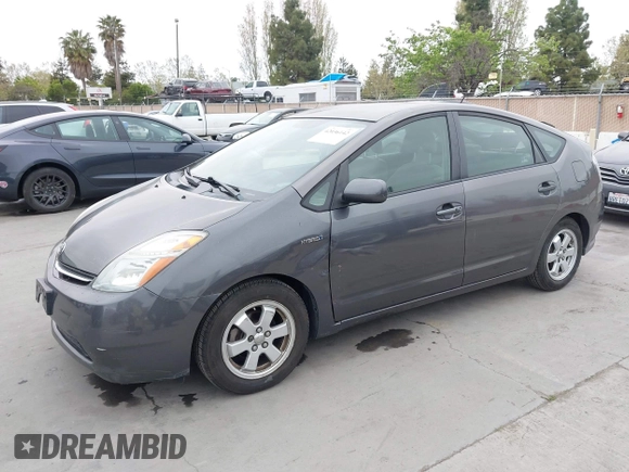 2008 Toyota Prius with VIN JTDKB20U383349679, listed as a IAAI auction lot 42036142 with 168,742 mi miles and . Bid and sale history available at carsss.com. Image 2.