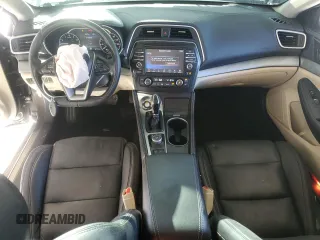 2016 Nissan Maxima SL with VIN 1N4AA6AP4GC906750, listed as a Copart auction lot 60691725 with 104,994 mi miles and Salvage title. Bid and sale history available at DreamBid. Image 8.
