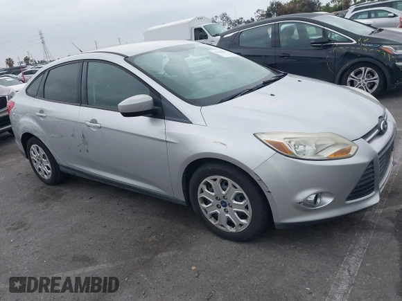 2012 Ford Focus SE with VIN 1FAHP3F27CL257447, listed as a IAAI auction lot 42180626 with 130,155 mi miles. Bid and sale history available at carsss.com. Image 1.
