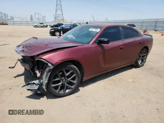 2019 Dodge Charger SXT with VIN 2C3CDXBG6KH576215, listed as a Copart auction lot 64611905 with 221,692 mi miles and Salvage title. Bid and sale history available at DreamBid. Image 1.