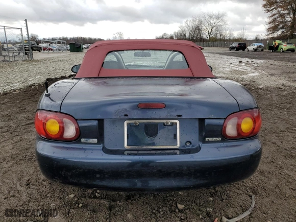 1999 Mazda MX-5 Miata with VIN JM1NB3530X0107869, listed as a Copart auction lot 79998094 with 188577 miles and Salvage Title. Bid and sale history available at carsss.com. Image 6.