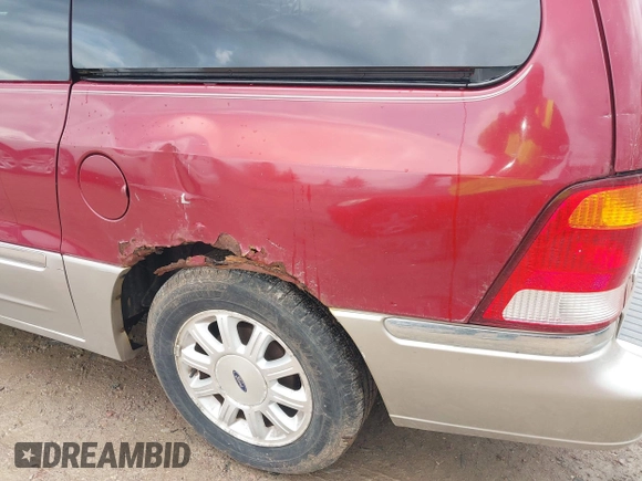 2003 Ford Windstar LTD with VIN 2FMDA58453BB87107, listed as a IAAI auction lot 42081676 with 164,638 mi miles and . Bid and sale history available at carsss.com. Image 6.