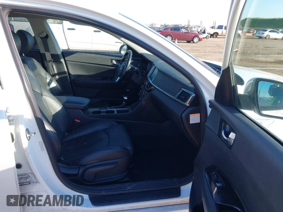 2017 Kia Optima EX with VIN KNAGU4LE8H5017318, listed as a IAAI auction lot 41885802 with 104,797 mi miles and . Bid and sale history available at DreamBid. Image 5.