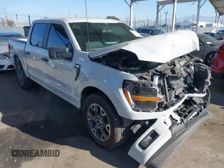 2024 Ford F-150 STX with VIN 1FTEW2KP7RFA29709, listed as a IAAI auction lot 41311395 with 5,883 mi miles and . Bid and sale history available at carsss.com. Image 1.