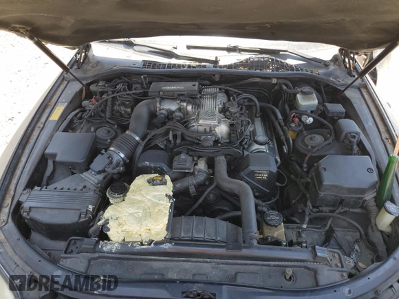 1994 Lexus SC 400 z VIN JT8UZ30C7R0037254, wystawiony jako Copart lot #57633215 z przebiegiem 196 214 mil mil oraz Szkody całkowita. Historia ofert i sprzedaży dostępna na DreamBid. Obrazek 11.