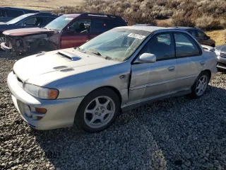 2001 Subaru Impreza RS with VIN JF1GC67521G503098, listed as a Copart auction lot 87637715 with 240,750 mi miles and Salvage title. Bid and sale history available at DreamBid. Image 1.