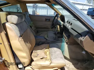 1982 Datsun 280ZX z VIN JN1HZ04S0CX433451, wystawiony jako Copart lot #53912864 z przebiegiem 200 629 mil mil oraz Tytuł czysty. Historia ofert i sprzedaży dostępna na DreamBid. Obrazek 10.