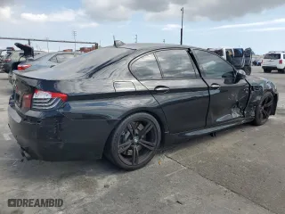 2015 BMW M5 with VIN WBSFV9C56FD594465, listed as a Copart auction lot 72085944 with 76,313 mi miles and Salvage Title. Bid and sale history available at carsss.com. Image 3.