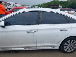 2016 Hyundai Sonata Sport with VIN 5NPE34AF7GH349130, listed as a IAAI auction lot 42158546 with 125,374 mi miles and . Bid and sale history available at carsss.com. Image 14.