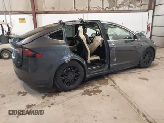 2016 Tesla Model X 70D with VIN 5YJXCBE2XGF025303, listed as a IAAI auction lot 41558869 with 77,793 mi miles and . Bid and sale history available at DreamBid. Image 4.