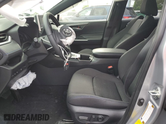 2023 Toyota RAV4 Hybrid SE with VIN JTM16RFV7PD100111, listed as a Copart auction lot 56682135 with 32,198 mi miles and Salvage title. Bid and sale history available at DreamBid. Image 7.