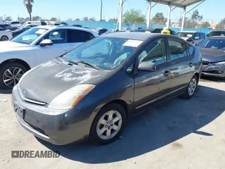 2007 Toyota Prius with VIN JTDKB20U273224400, listed as a IAAI auction lot 41855291 with 185,086 mi miles. Bid and sale history available at carsss.com. Image 2.