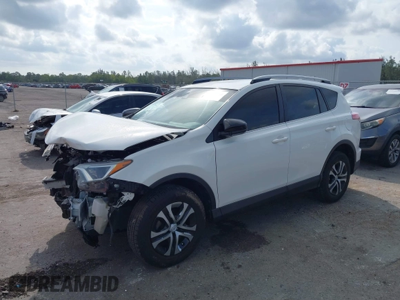2017 Toyota RAV4 LE with VIN JTMZFREV3HJ143416, listed as a IAAI auction lot 41861981 with 115,241 mi miles and . Bid and sale history available at DreamBid. Image 17.