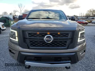 2022 Nissan Titan XD Platinum Reserve with VIN 1N6AA1FB9NN104042, listed as a Copart auction lot 75653184 with 28,709 mi miles and Salvage Title. Bid and sale history available at carsss.com. Image 5.