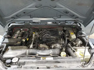 2014 Jeep Wrangler Sport with VIN 1C4AJWAG9EL322982, listed as a Copart auction lot 51145075 with 122,686 mi miles and Salvage Title. Bid and sale history available at DreamBid. Image 12.