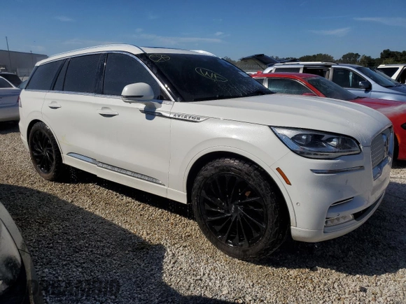 2021 Lincoln Aviator Reserve z VIN 5LM5J7WCXMGL18310, wystawiony jako Copart lot #76247904 z przebiegiem 69 111 mil mil oraz Nie do naprawy • Non repairable. Historia ofert i sprzedaży dostępna na DreamBid. Obrazek 4.