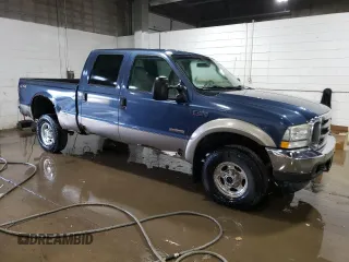 2004 Ford Super Duty F-250 XL with VIN 1FTNW21P84EE08444, listed as a Copart auction lot 73858064 with 192,888 mi miles and Clean Title. Bid and sale history available at carsss.com. Image 4.