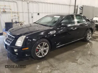 2009 Cadillac STS AWD w/1SB with VIN 1G6DD67V590121195, listed as a Copart auction lot 70758044 with 93,298 mi miles and Salvage Title. Bid and sale history available at carsss.com. Image 1.