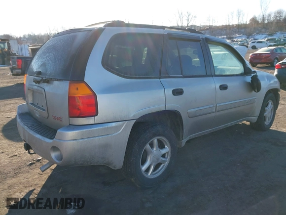 2005 GMC Envoy SLE with VIN 1GKDT13S452194933, listed as a IAAI auction lot 41426512 with 176,897 mi miles. Bid and sale history available at carsss.com. Image 4.