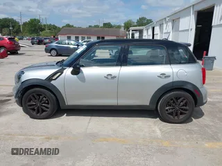 2013 MINI Countryman S z VIN WMWZC3C50DWP21636, wystawiony jako IAAI lot #42113244 z przebiegiem 85 344 mil mil oraz . Historia ofert i sprzedaży dostępna na DreamBid. Obrazek 14.