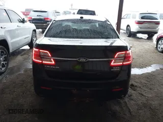 2015 Ford Taurus SEL z VIN 1FAHP2E87FG203272, wystawiony jako IAAI lot #41717231 z przebiegiem 95 829 mil mil oraz . Historia ofert i sprzedaży dostępna na DreamBid. Obrazek 16.