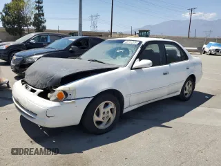 2000 Toyota Corolla VE with VIN 1NXBR12E3YZ347724, listed as a Copart auction lot 63711225 with 279,121 mi miles and Salvage title. Bid and sale history available at DreamBid. Image 1.
