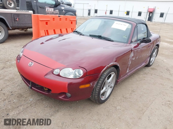 2003 Mazda MX-5 Miata Cloth z VIN JM1NB353X30308589, wystawiony jako IAAI lot #41454795 z przebiegiem 110 940 mil mil oraz . Historia ofert i sprzedaży dostępna na DreamBid. Obrazek 2.