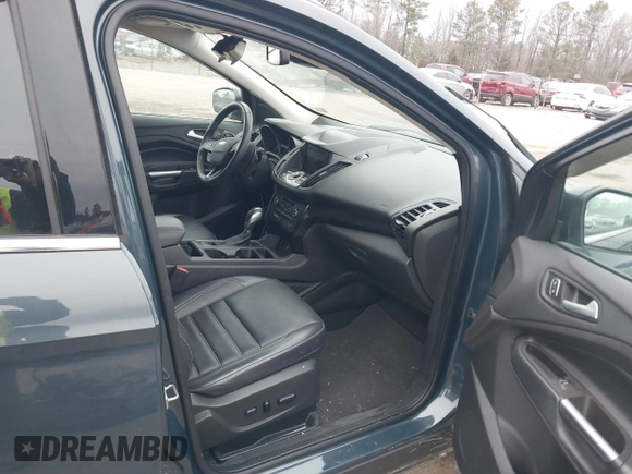 2019 Ford Escape Titanium with VIN 1FMCU9J93KUB84831, listed as a IAAI auction lot 41514146 with 105,072 mi miles. Bid and sale history available at carsss.com. Image 5.