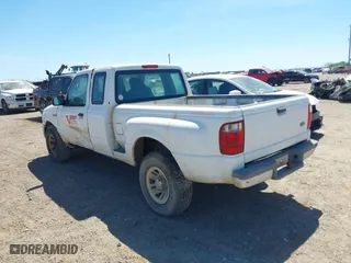 2004 Ford Ranger XL with VIN 1FTYR14U04PA70719, listed as a IAAI auction lot 41802006 with 203,803 mi miles. Bid and sale history available at carsss.com. Image 3.