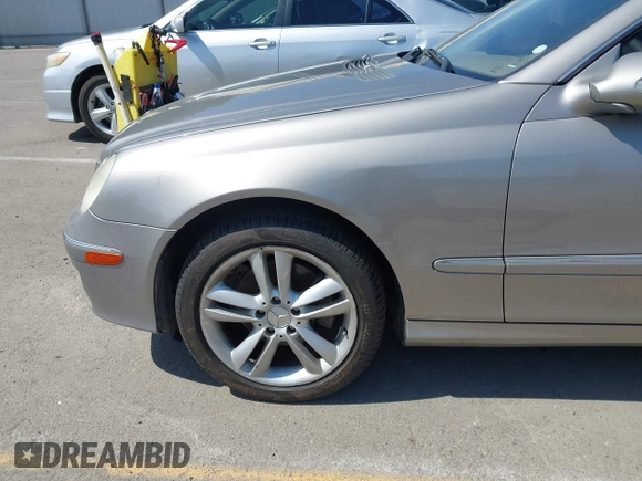 2007 Mercedes-Benz CLK-Class 3.5L with VIN WDBTJ56H47F215889, listed as a IAAI auction lot 42109563 with 106,593 mi miles. Bid and sale history available at carsss.com. Image 12.