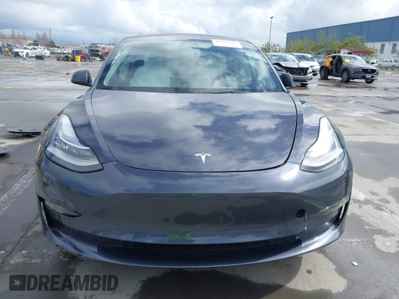 2022 Tesla Model 3 Long Range with VIN 5YJ3E1EB0NF259904, listed as a IAAI auction lot 41826642 with 42,272 mi miles and . Bid and sale history available at DreamBid. Image 12.