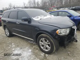 2013 Dodge Durango Crew with VIN 1C4SDJDT9DC538529, listed as a Copart auction lot 88201115 with 142,753 mi miles and Salvage title. Bid and sale history available at DreamBid. Image 4.