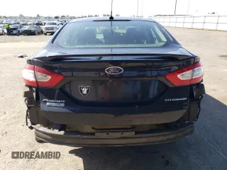 2015 Ford Fusion Energi Titanium with VIN 3FA6P0SU9FR147017, listed as a Copart auction lot 51545365 with 147,241 mi miles and Salvage Title. Bid and sale history available at carsss.com. Image 6.