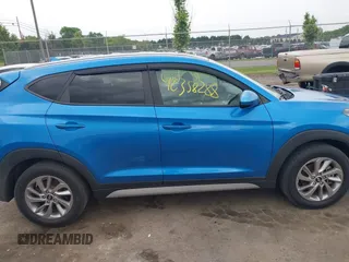 2018 Hyundai Tucson SEL z VIN KM8J3CA4XJU717977, wystawiony jako IAAI lot #42358288 z przebiegiem 121 919 mil mil oraz . Historia ofert i sprzedaży dostępna na DreamBid. Obrazek 14.