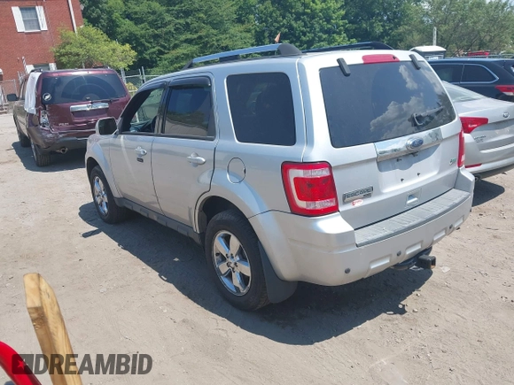 2010 Ford Escape Limited z VIN 1FMCU9EG7AKC87480, wystawiony jako IAAI lot #42748832 z przebiegiem 86 566 mil mil oraz . Historia ofert i sprzedaży dostępna na DreamBid. Obrazek 3.